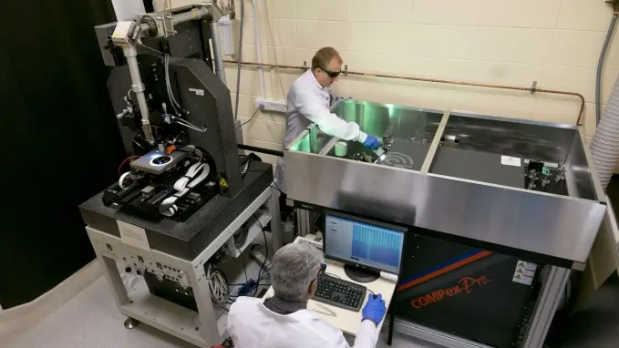 ANU researchers aligning the Pharos laser.